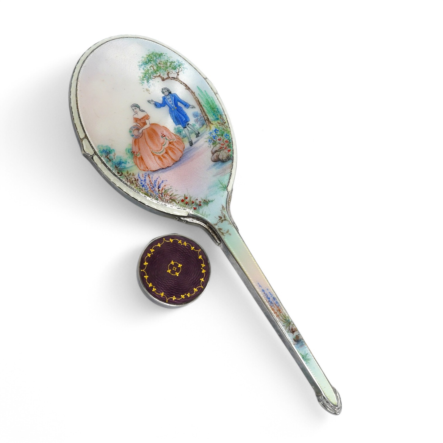 A George VI silver and enamelled hand mirror, by Daniel Manufacturing Company, Birmingham, 1947, 28.3cm, together with a Scandinavian 925 and enamel circular pill box. Condition - fair